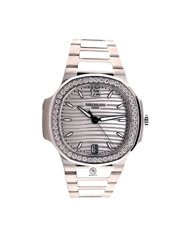 Patek Philippe Nautilus Steel Ladies' Nautilus Steel Silver Wave Dial Factory Diamond Bezel 7018/1A-001 Box and Papers PreOwned